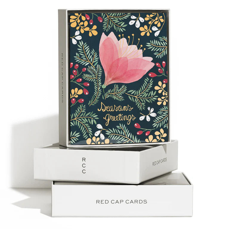A boxed set of eight A2 holiday greeting cards with a floral design and 'Season's Greetings' text on the cover, along with a matching envelope.