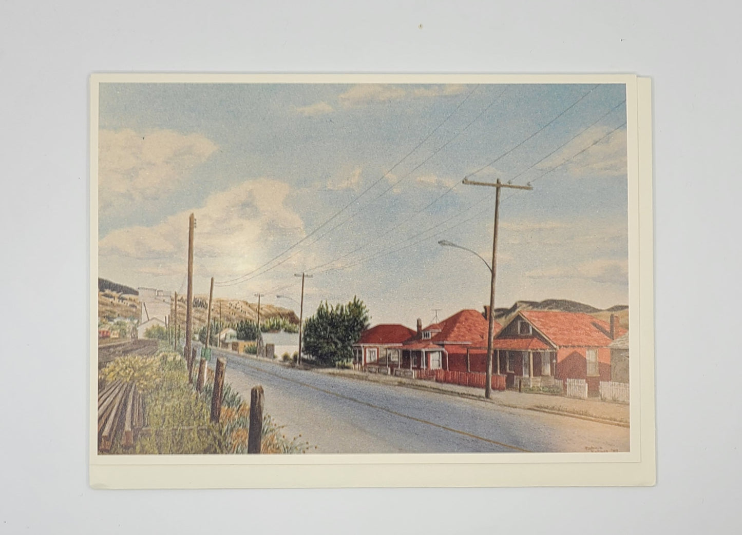 Painting of a suburban street with houses and power lines under a cloudy sky.