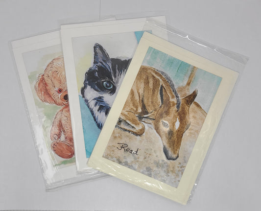 Set of three greeting cards with animal illustrations on a gray background
