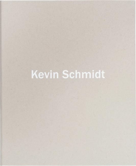 A book cover with the name 'Kevin Schmidt' printed in the center.