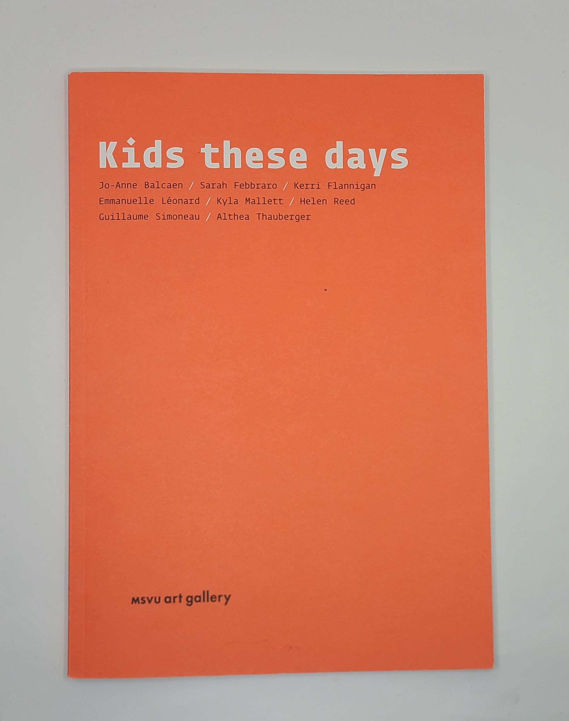 Book cover with 'Kids these days' text on an orange background