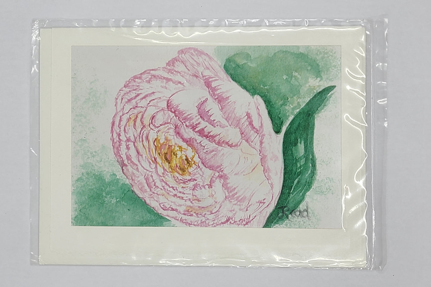 Card with a pink flower illustration on a white background