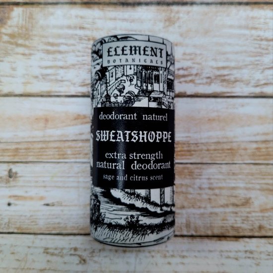 A tube of deodorant named 'Sweatshoppe' in a limited edition packaging featuring a black and white illustration.