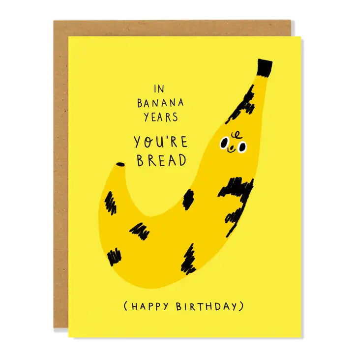 Birthday card with a banana illustration and humorous text on a yellow background