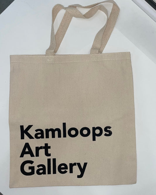 Beige tote bag with 'Kamloops Art Gallery' text on a white background