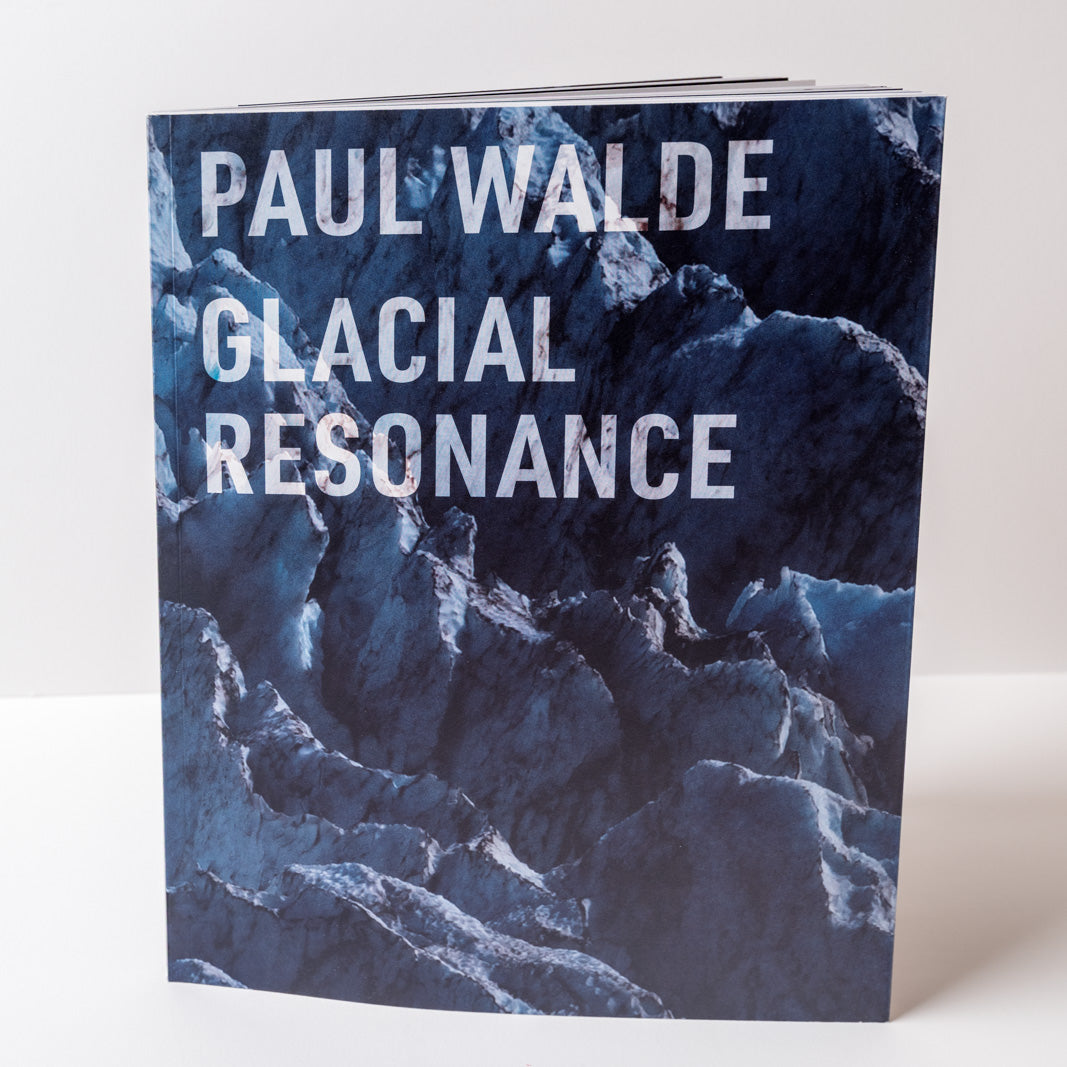 Book titled 'Glacial Resonance' by Paul Walde with a blue and white cover mountainous glacier disign.