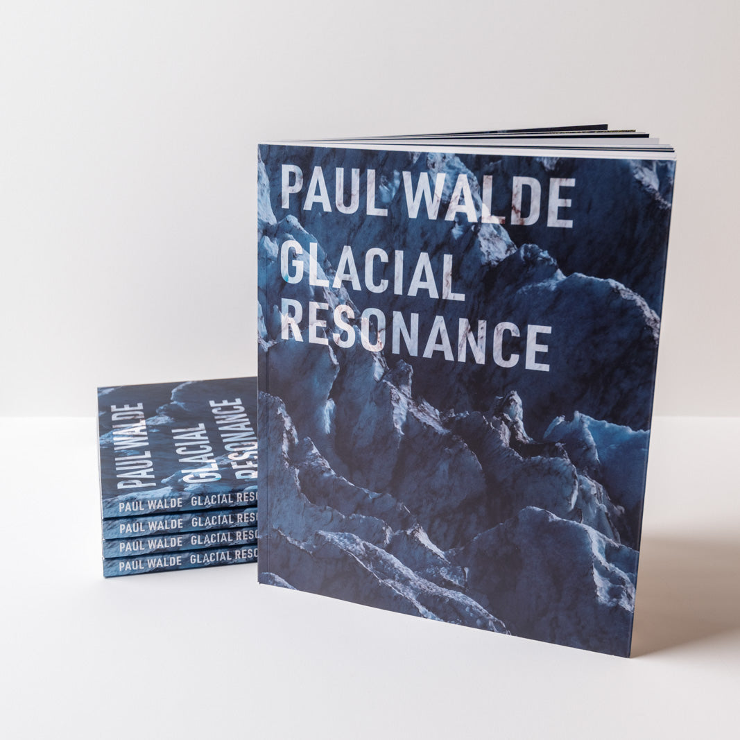 Book titled 'Glacial Resonance' by Paul Walde with a blue and white cover design of glaciers.