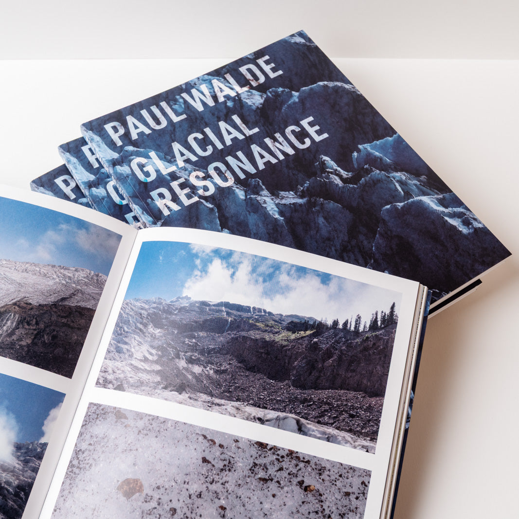 Book titled 'Glacial Resonance' by Paul Walde with mountain imagery on a white background